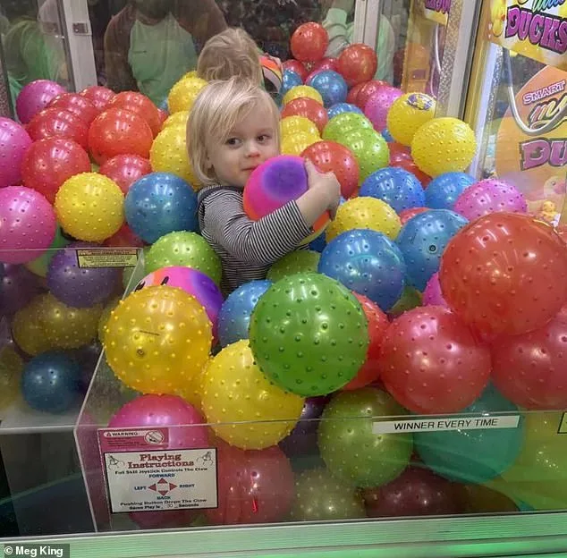 Two-Year-Old's Playful Predicament: Stuck in Claw Machine at Missouri Sports Center