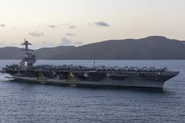 Iran Escalates Military Rhetoric Amid U.S. Carrier Deployment in Red Sea, Threatens Retaliation Against Supporting Infrastructure