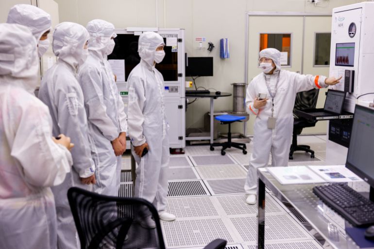 Taiwan's AI boom drives jobs and growth despite infrastructure concerns.