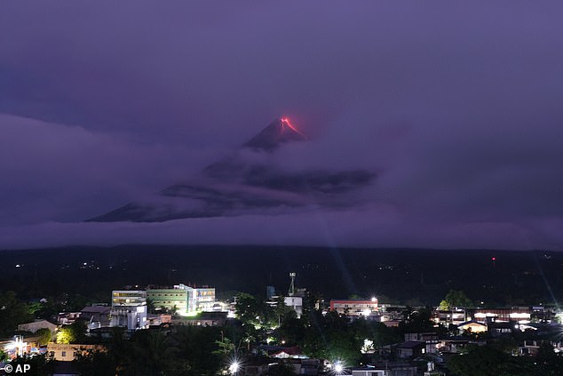 Philippines corrects report: Green fireball over Mount Mayon was atmospheric, not a rock.