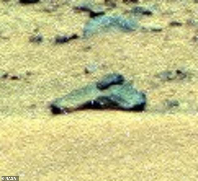 NASA denies alien gun claims, calling it a rock and pareidolia.