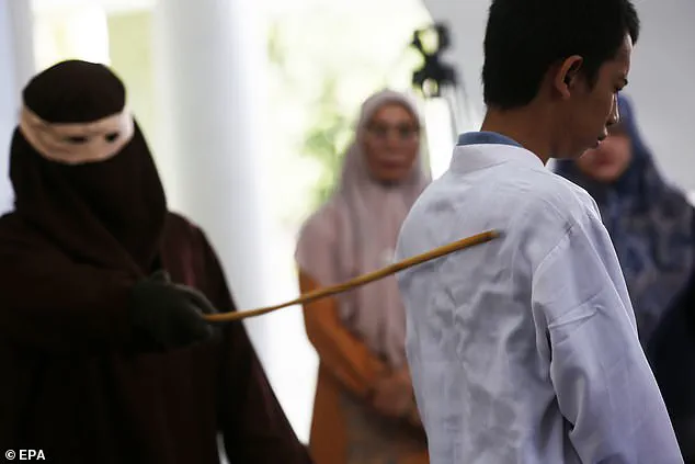 Two men publicly flogged for gay sex in Indonesia