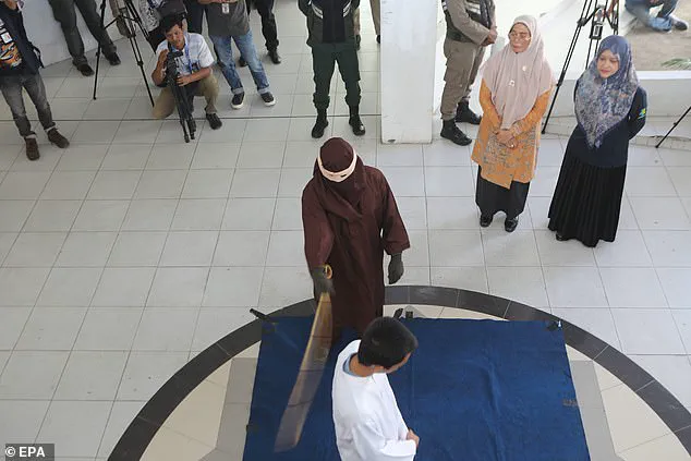 Two men publicly flogged for gay sex in Indonesia