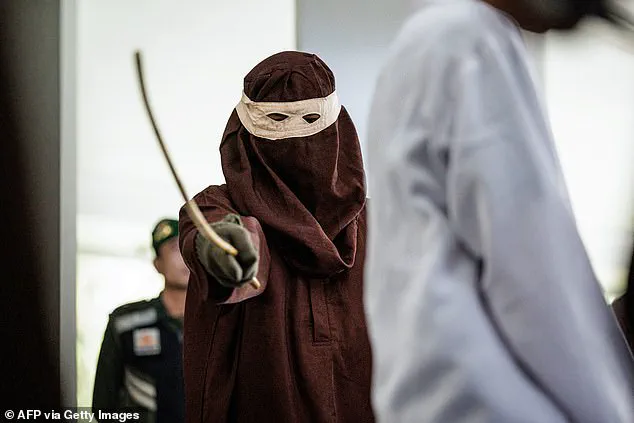 Two men publicly flogged for gay sex in Indonesia