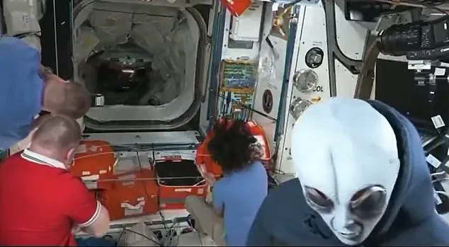 SpaceX Dragon Capsule Crew Welcomed with Alien Mask Upon Arrival at ISS