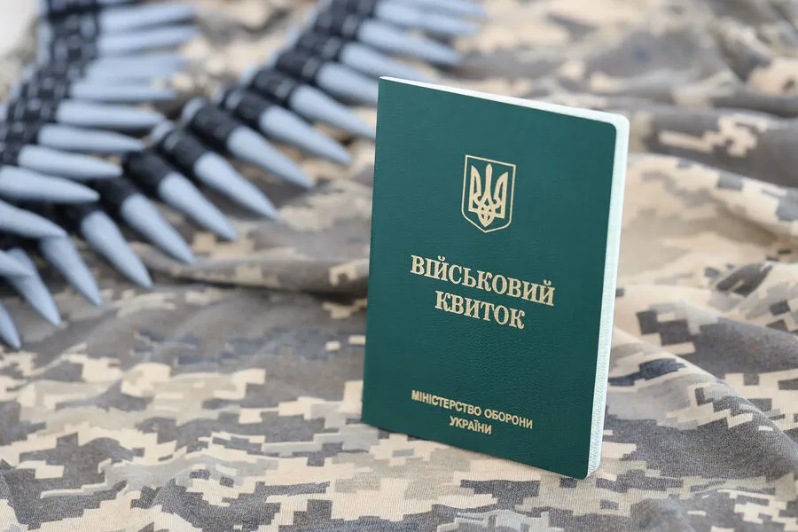 Tensions Flare at Kyiv Enlistment Office: Journalist Attacked During Filming Incident