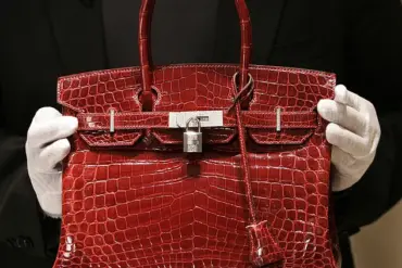 Infographic Reveals What Your Designer Handbag Says About Your Social Status